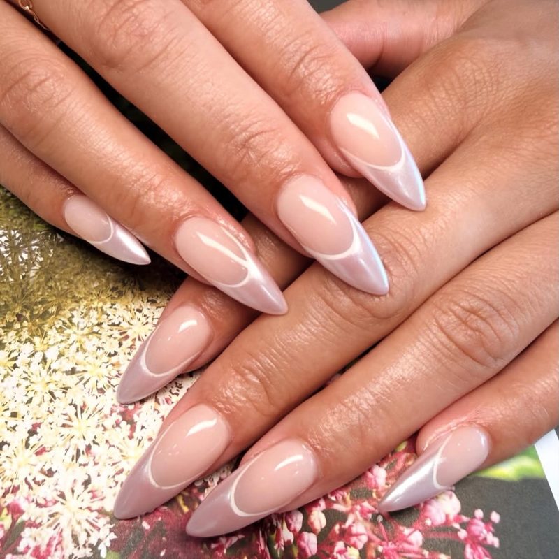 Pearl chrome French outline almond nails by Nini Nail Bar
