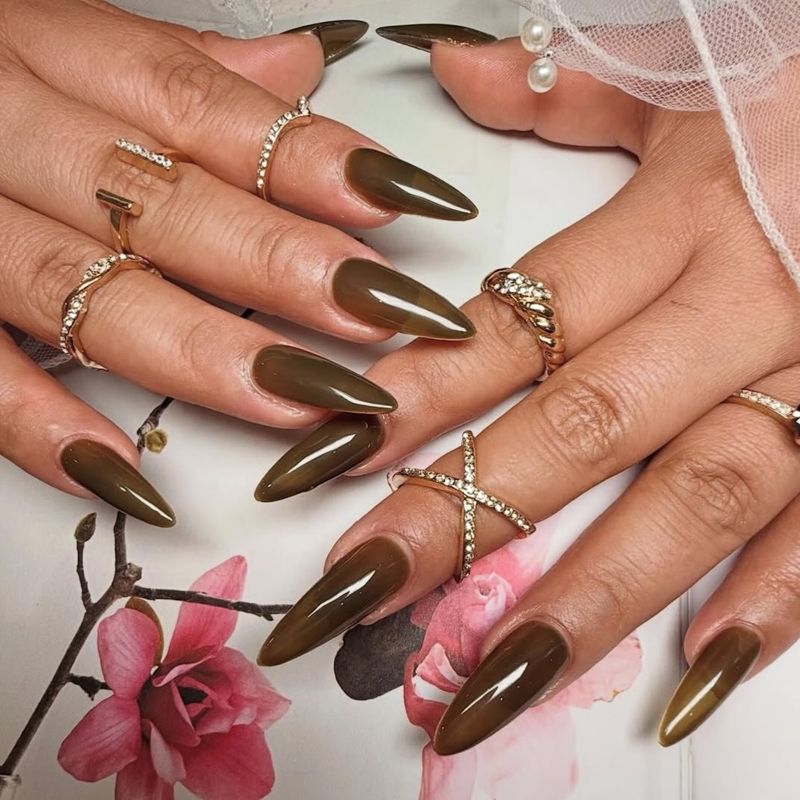 Chocolate chrome almond nails by Nini Nail Bar